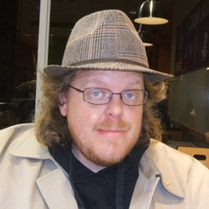 An image of Mark Zieg in a hat and glasses at Wasatch Photonics.
