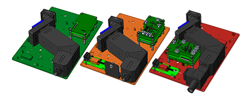 Image of 3 OEM X series spectrometers for raman spectroscopy from Wasatch Photonics in 3 colours of green, orange and red (from left to right).